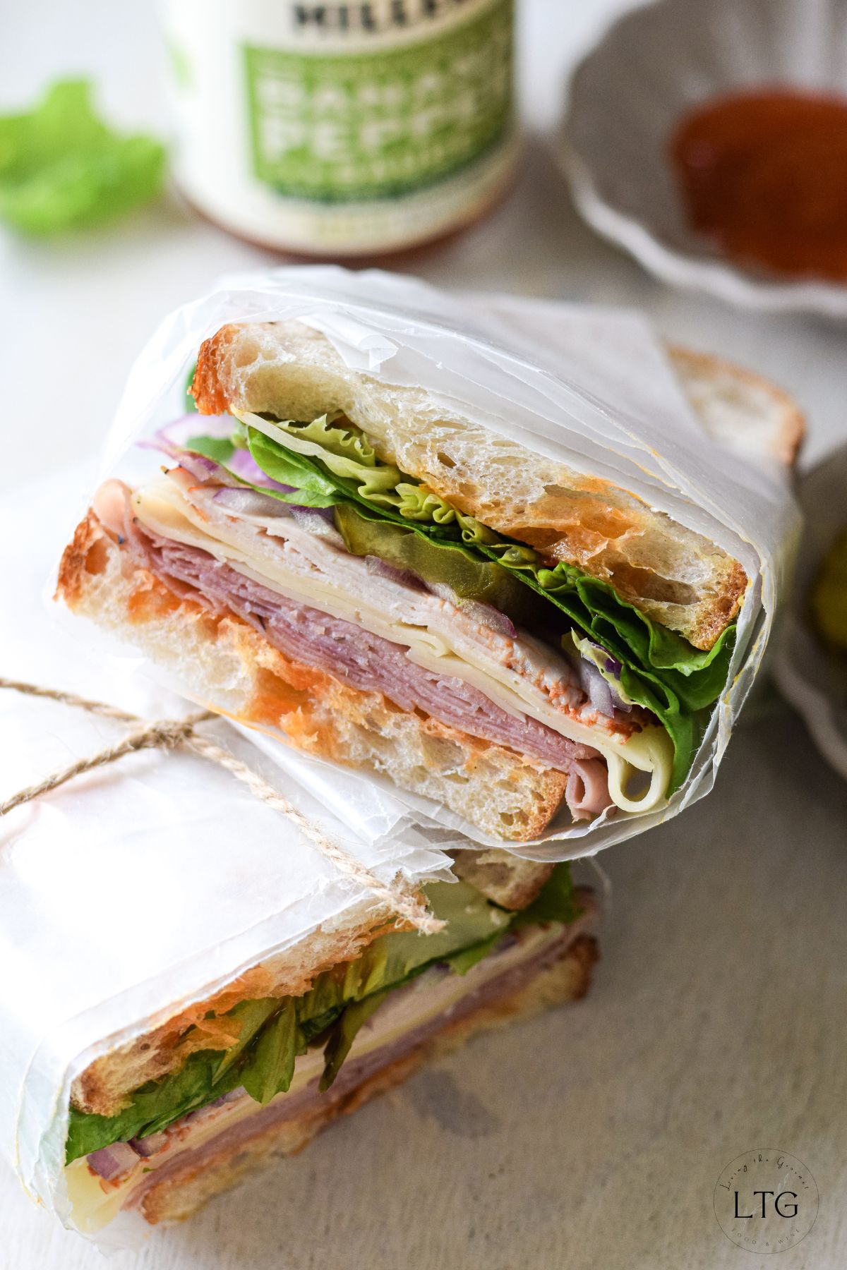 You are currently viewing Turkey, Ham and Swiss Deli Sandwich with Miller’s Banana Pepper Sauce
